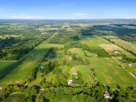 Rhonda See assisting a home buyer, showcasing her deep understanding of Central Ohio's property landscape.